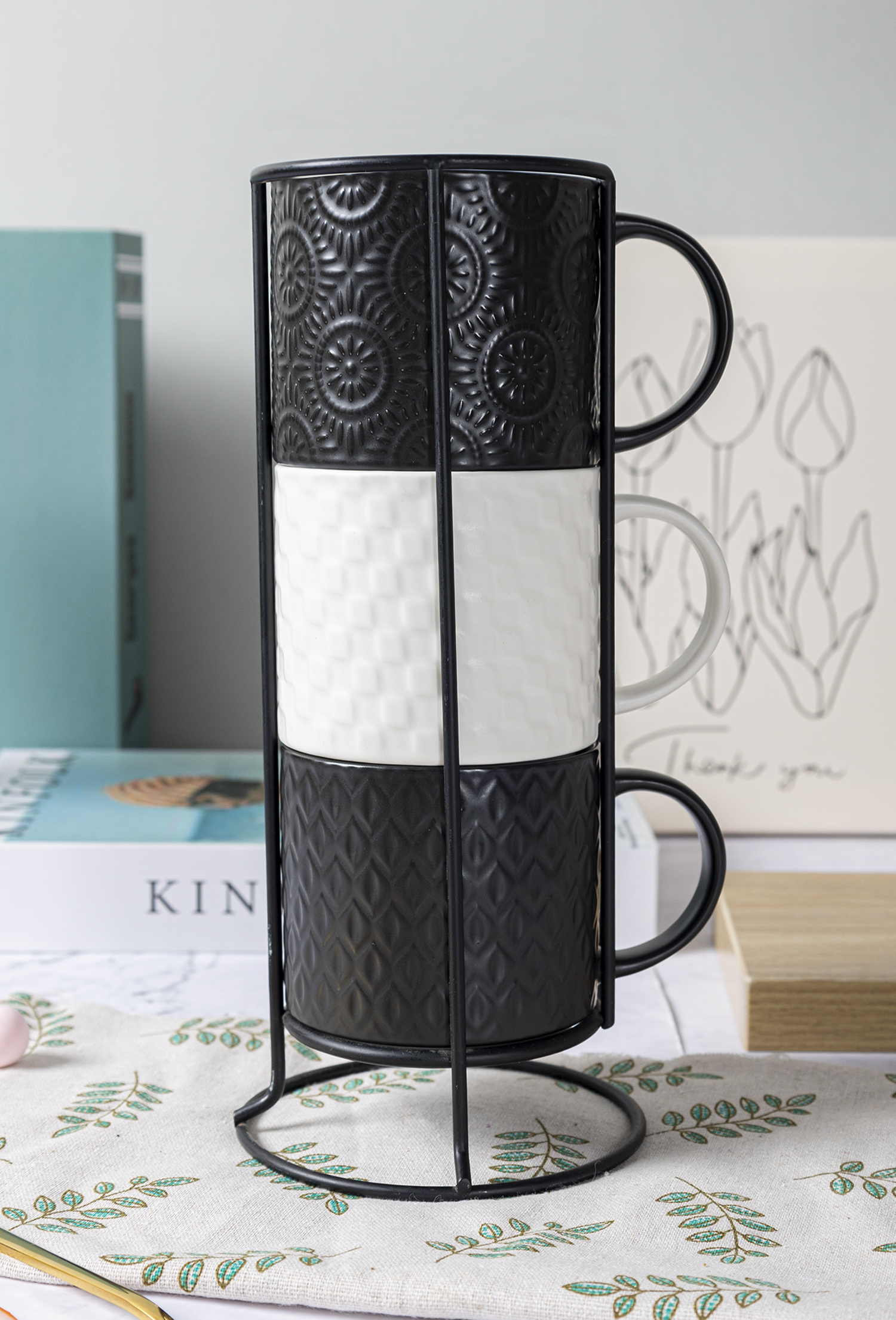 CHANGSHA HAPPY GO Matte Black and White Reactive Glaze New Bone China with Embossed Craft Mug Set | happygodinnerware.com