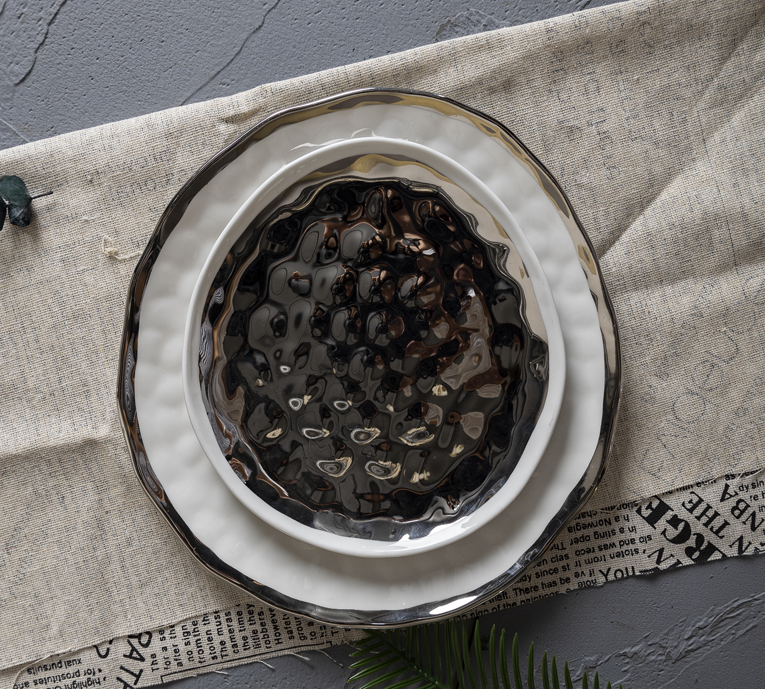 CHANGSHA HAPPY GO Reflective Silver Electroplated Bone China Tea and Dinnerware Set with Hammer Texture for Elegant Dining Occasions |happygodinnerware.com