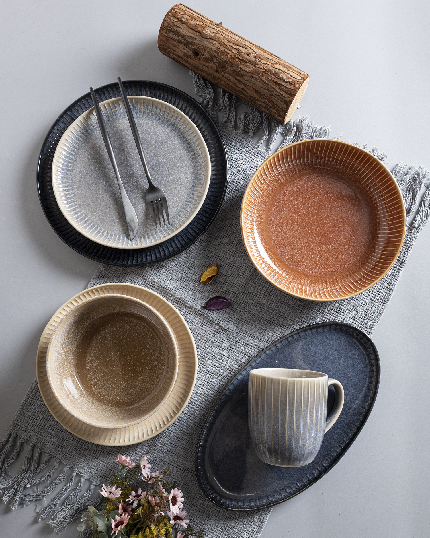 CHANGSHA HAPPY GO Classic Vertical Striped Reactive Glaze Stoneware Mug and Dinnerware Set in Six Color Variations  |happygodinnerware.com