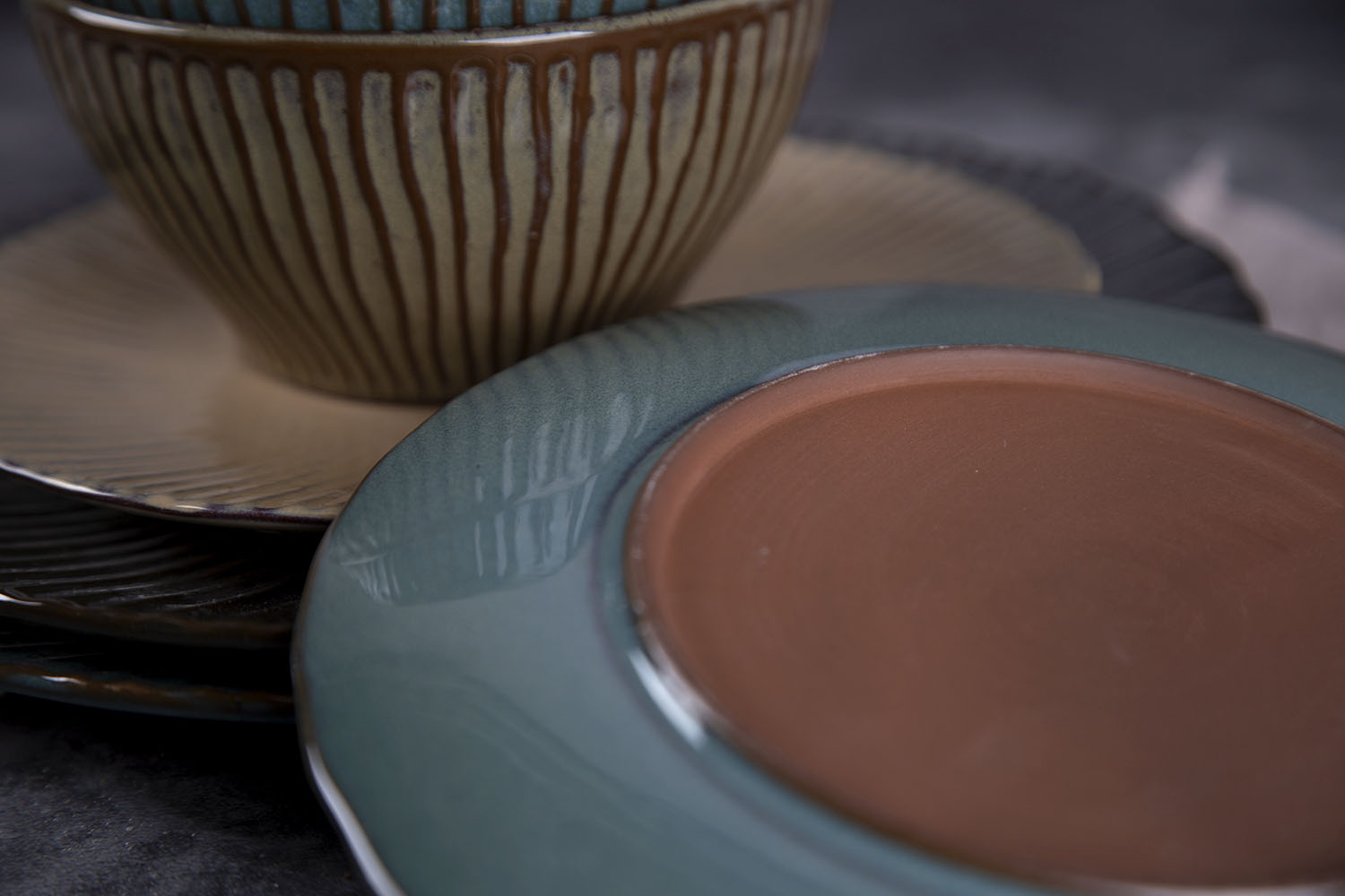 CHANGSHA HAPPY GO Sunburst Kiln Reactive Embossed Ceramic Tableware Set | happygodinnerware.com