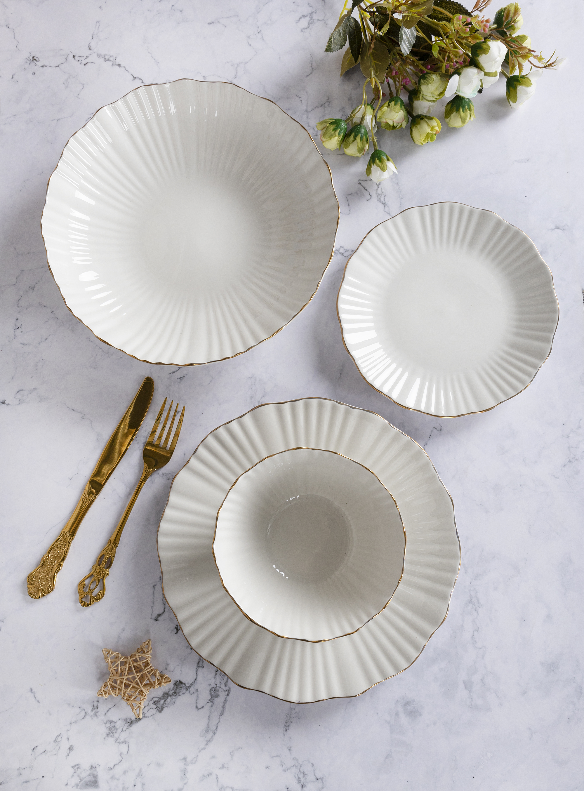 CHANGSHA HAPPY GO Elegant White Porcelain Embossed Dinnerware Set with Petal-Shaped Relief Design |happygodinnerware.com