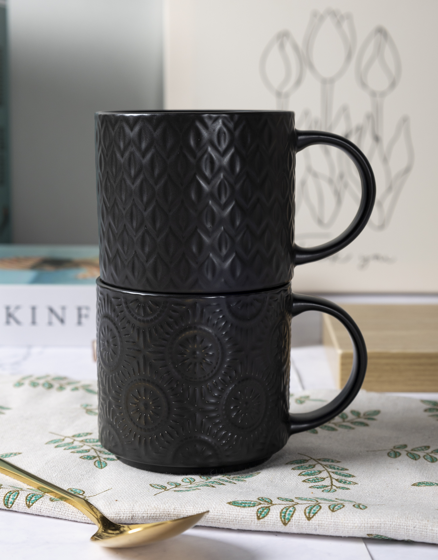 CHANGSHA HAPPY GO Matte Black and White Reactive Glaze New Bone China with Embossed Craft Mug Set | happygodinnerware.com