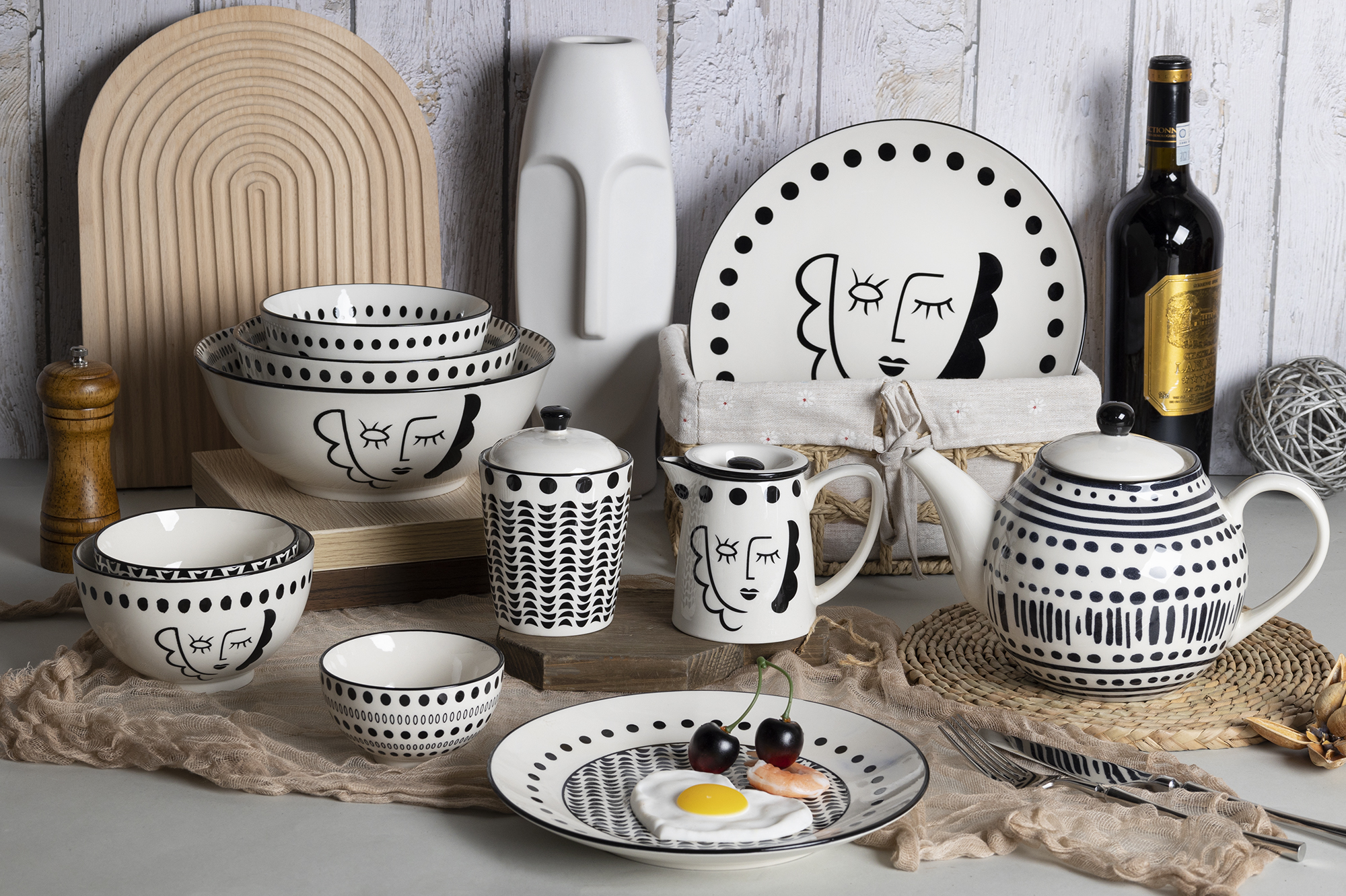 CHANGSHA HAPPY GO Abstract Face Art Stoneware Tea and Dinnerware Set with Monochrome Decals |happygodinnerware.com