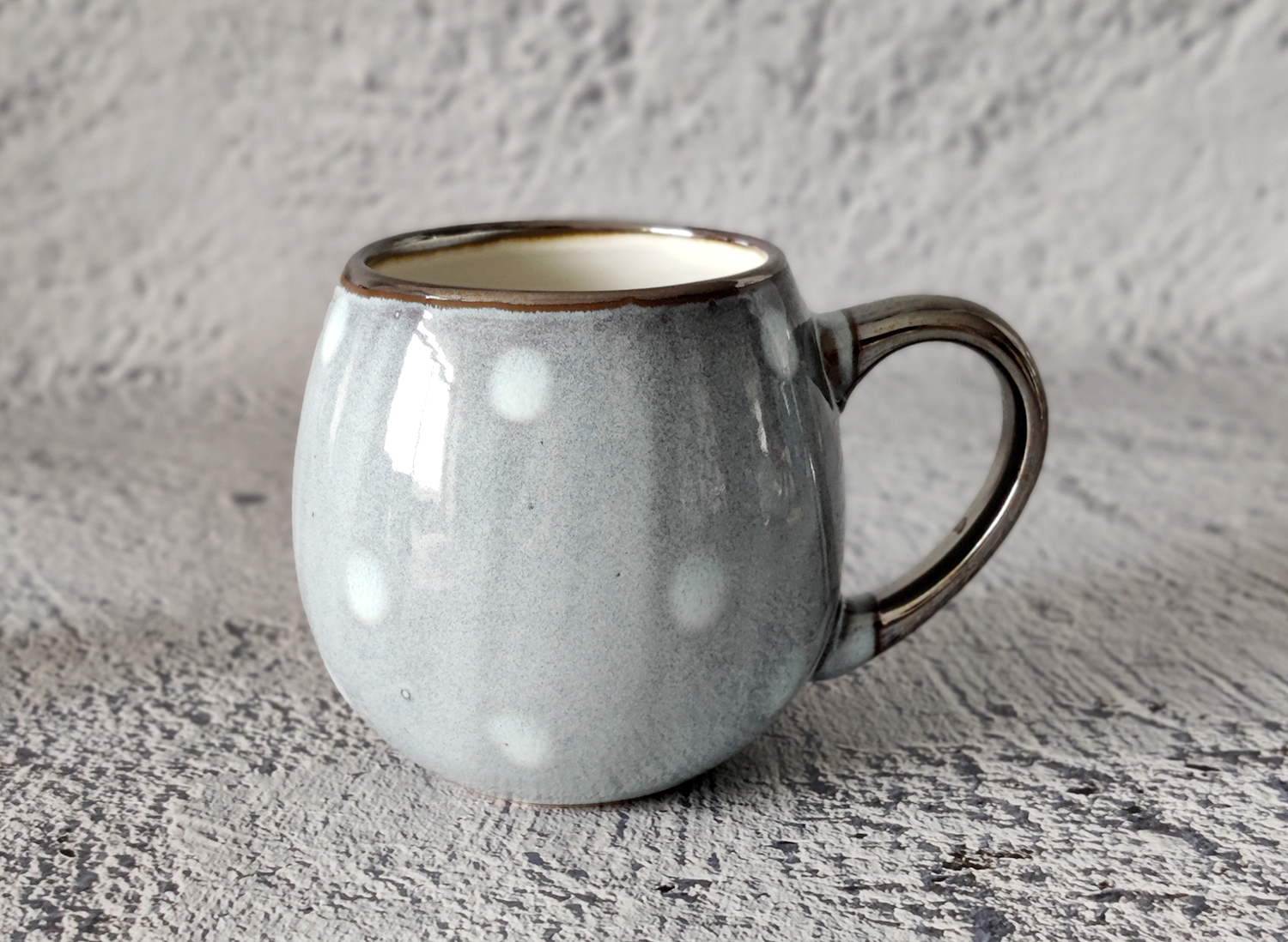 CHANGSHA HAPPY GO Reactive Glaze Stoneware Mug and Bowl Set with Hand-Drawn Polka Dots and Rolled Rim | happygodinnerware.com