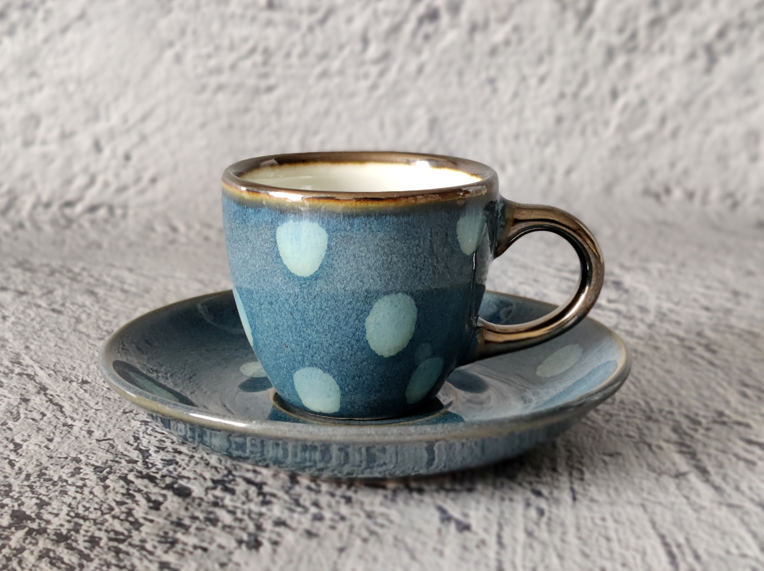 CHANGSHA HAPPY GO Reactive Glaze Stoneware Mug and Bowl Set with Hand-Drawn Polka Dots and Rolled Rim | happygodinnerware.com