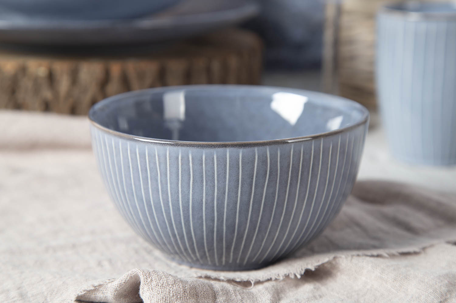 CHANGSHA HAPPY GO Vertical Carving Stripe Stoneware with Reactive Glaze | happygodinnerware.com
