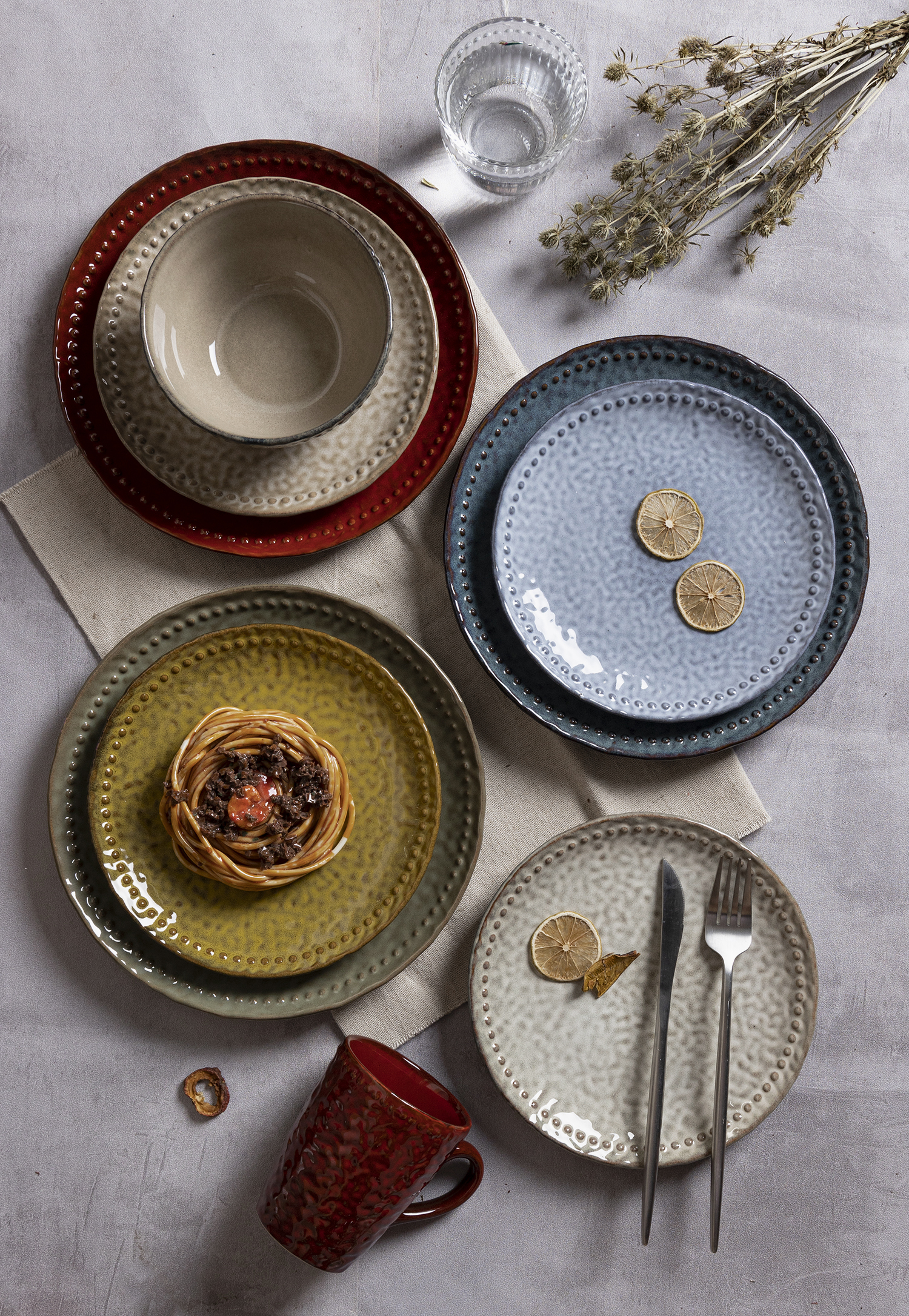CHANGSHA HAPPY GO Multi-Colored Hammered Texture Stoneware Dinnerware Set | Reactive Glaze Rustic Finish | Plates, Bowls & Mugs for Home & Café Use|happygodinnerware.com