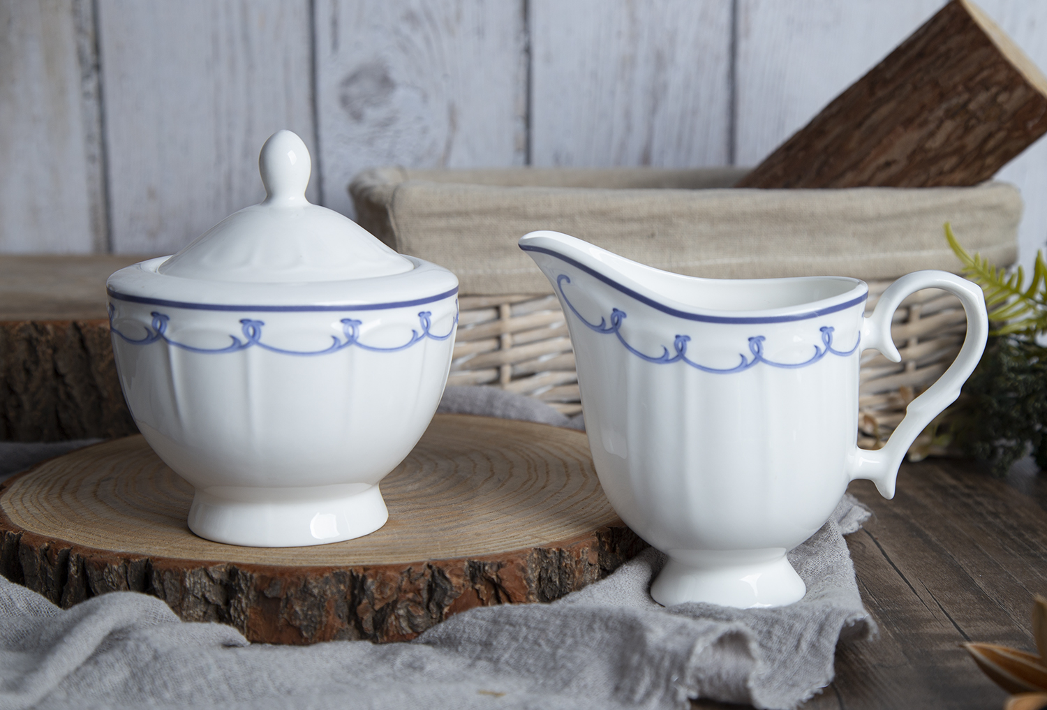 CHANGSHA HAPPY GO  Modern Curved Stripe Embossed Bone China Dinnerware Set – Stylish White Plates, Teapots, and Cups |happygodinnerware.com