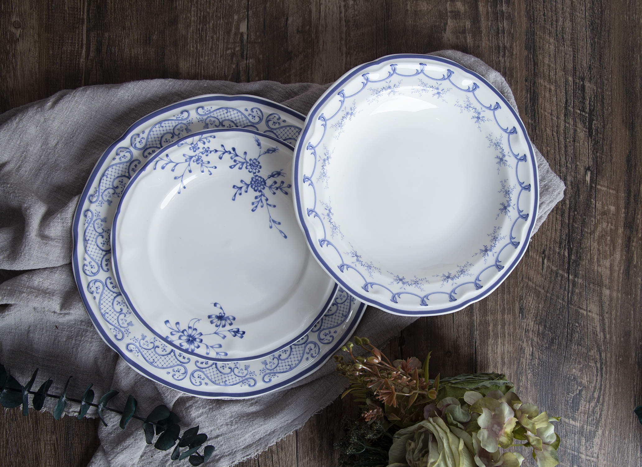 CHANGSHA HAPPY GO  Modern Curved Stripe Embossed Bone China Dinnerware Set – Stylish White Plates, Teapots, and Cups |happygodinnerware.com