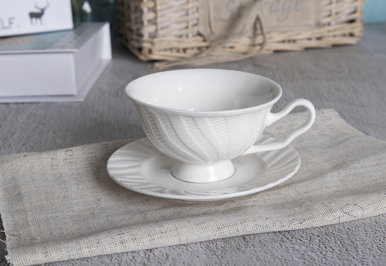 CHANGSHA HAPPY GO  Modern Curved Stripe Embossed Bone China Dinnerware Set – Stylish White Plates, Teapots, and Cups |happygodinnerware.com