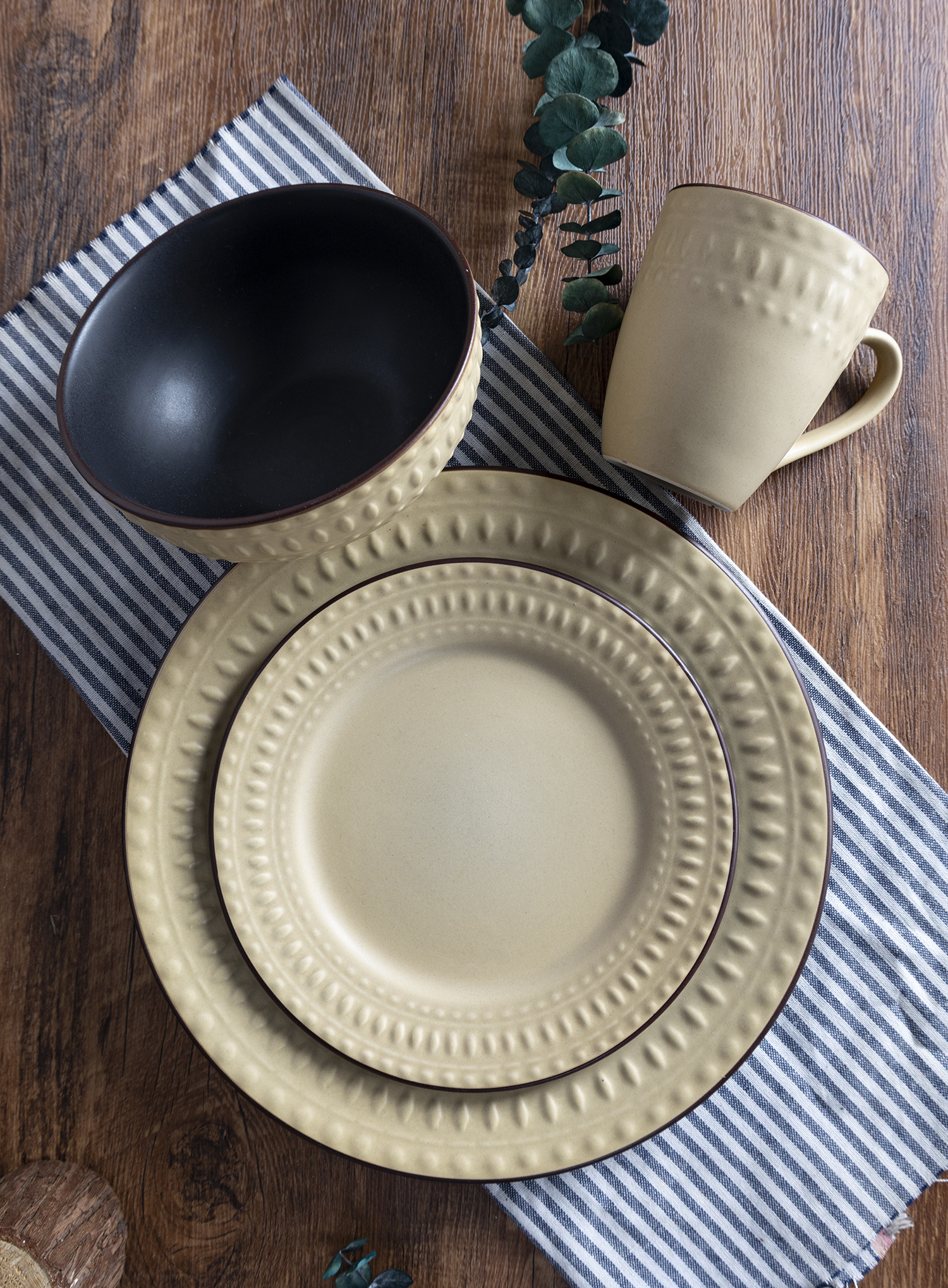 CHANGSHA HAPPY GO Embossed Stoneware Dinnerware Set with Matte Color Glaze and Textured Dot Relief Design in Rustic Tones |happygodinnerware.com