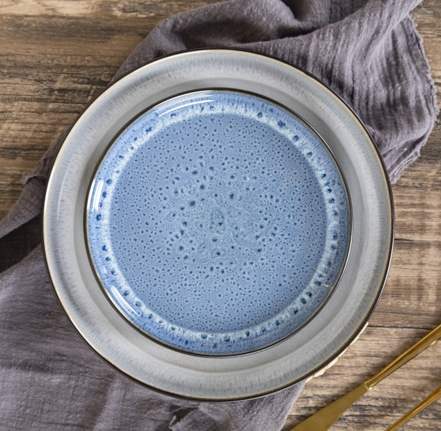 CHANGSHA HAPPY GO Artisan Reactive Glaze Stoneware Dinner Set with Multicolor Handcrafted Interiors and Gloss Finish |happygodinnerware.com