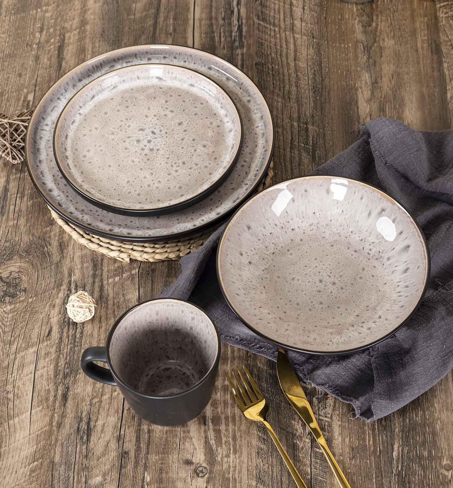 CHANGSHA HAPPY GO Artisan Reactive Glaze Stoneware Dinner Set with Multicolor Handcrafted Interiors and Gloss Finish |happygodinnerware.com