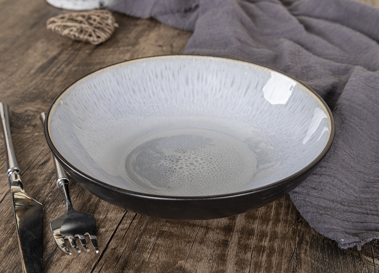 CHANGSHA HAPPY GO Artisan Reactive Glaze Stoneware Dinner Set with Multicolor Handcrafted Interiors and Gloss Finish |happygodinnerware.com