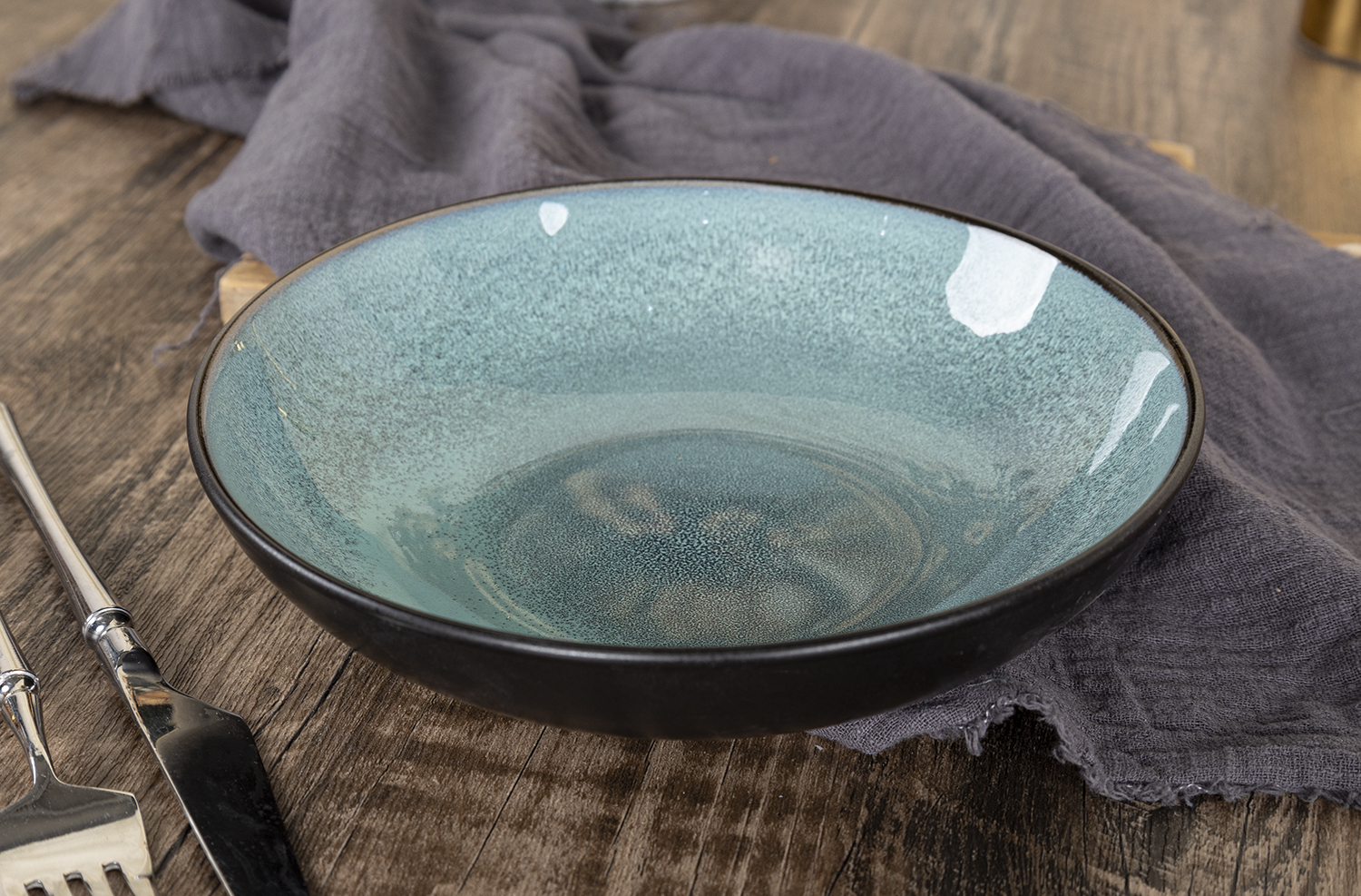 CHANGSHA HAPPY GO Artisan Reactive Glaze Stoneware Dinner Set with Multicolor Handcrafted Interiors and Gloss Finish |happygodinnerware.com