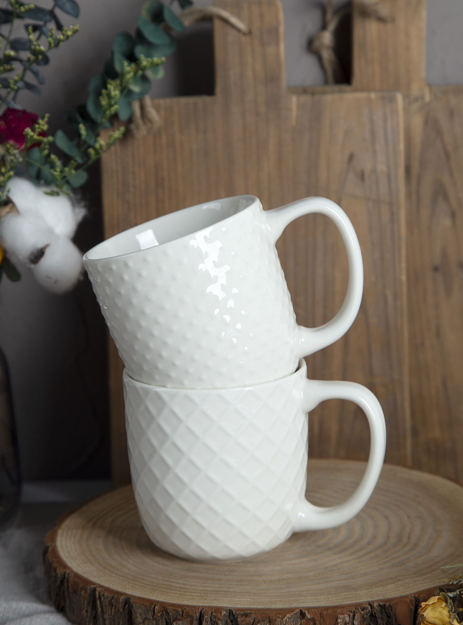 CHANGSHA HAPPY GO White Embossed Bone China Mugs – Glossy Color Glaze with 3D Relief Texture |happygodinnerware.com