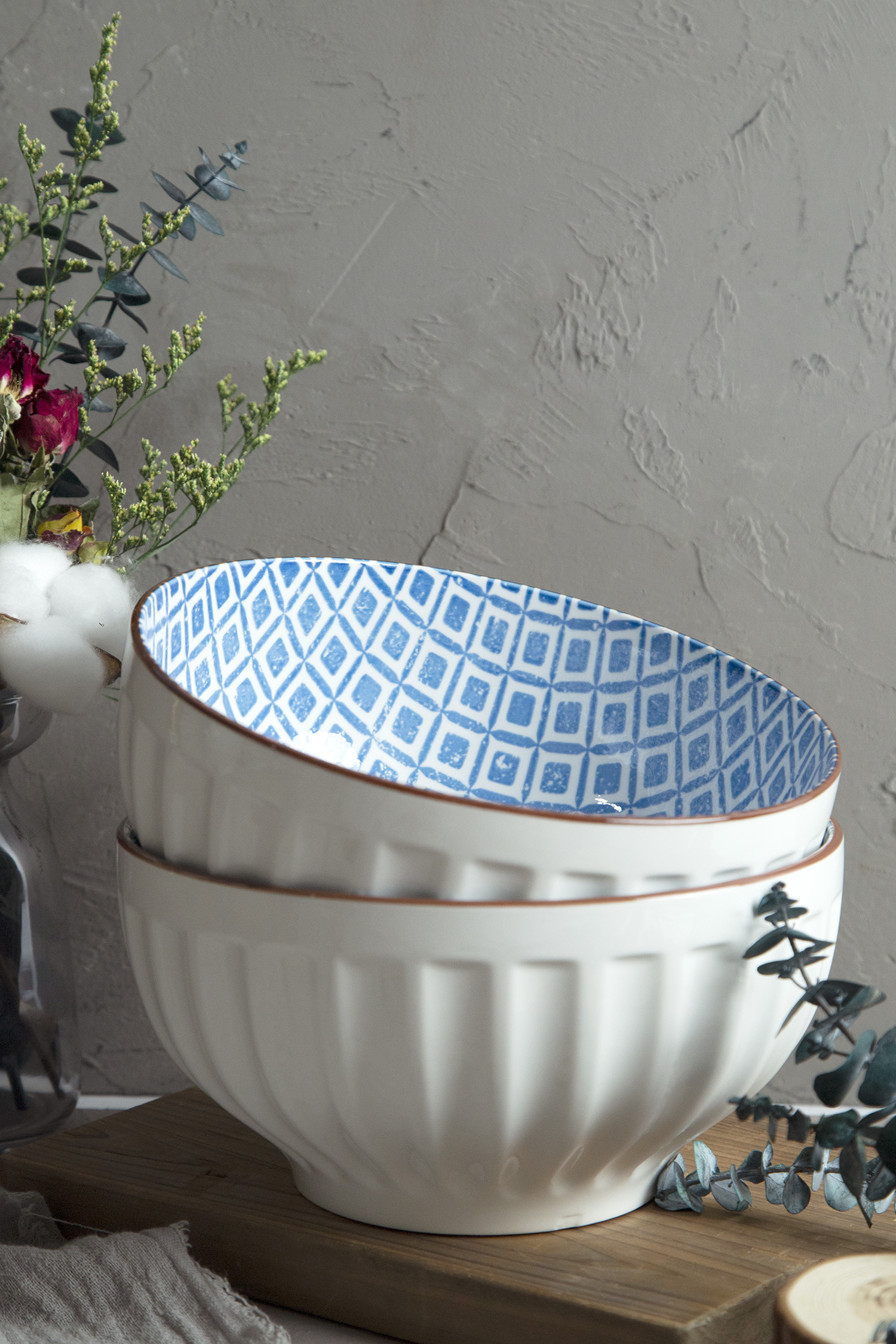CHANGSHA HAPPY GO White Porcelain Melon Stripe Embossed Bowls with Blue Geometric Interiors | happygodinnerware.com