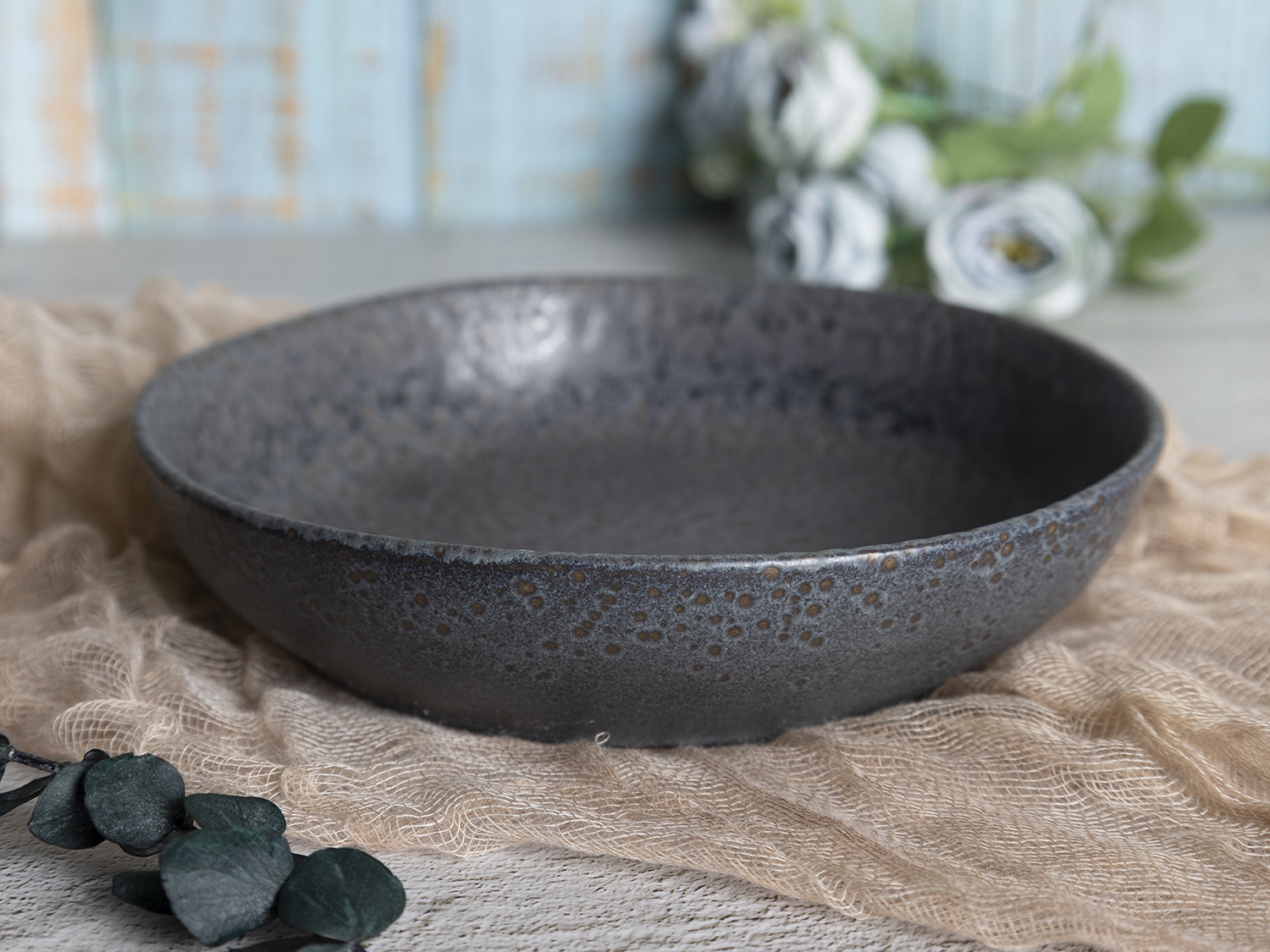 ​CHANGSHA HAPPY GO  Reactive Glaze Stoneware Collection in Charcoal Pebble Texture with Contemporary Look  |happygodinnerware.com