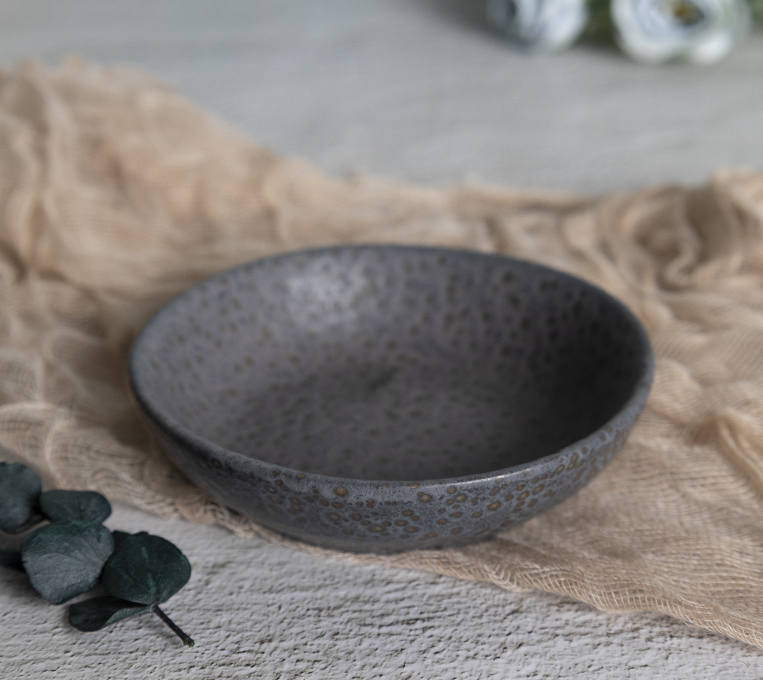 ​CHANGSHA HAPPY GO  Reactive Glaze Stoneware Collection in Charcoal Pebble Texture with Contemporary Look  |happygodinnerware.com