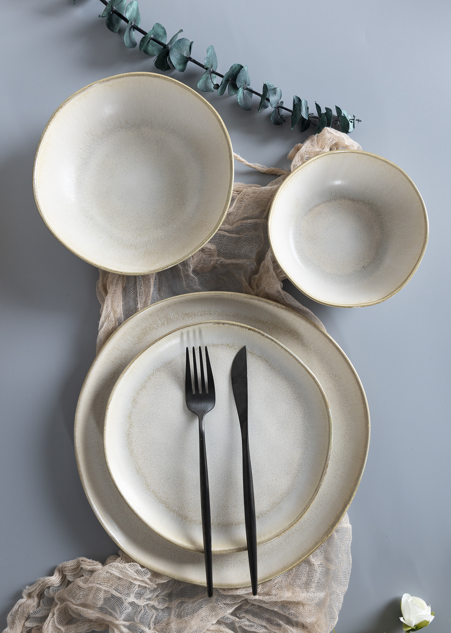 ​CHANGSHA HAPPY GO  Soft Ivory Beige Stoneware Dining Set with Subtle Reactive Glaze and Rustic Charm |happygodinnerware.com