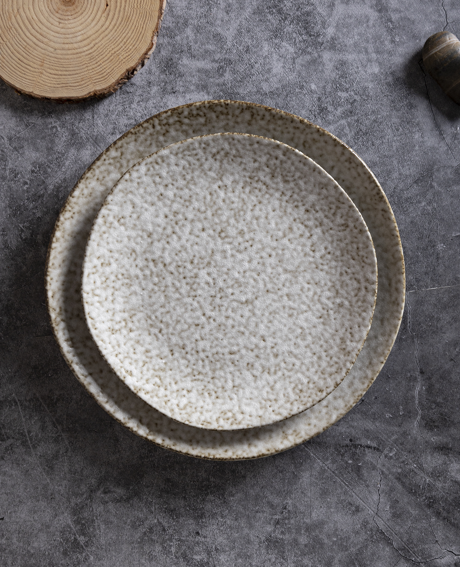 CHANGSHA HAPPY GO Speckled Reactive Glaze Stoneware Dinnerware Set | Rustic White & Brown Artisan Texture | Irregular Edge Plates & Cups in Wabi-Sabi Style|happygodinnerware.com