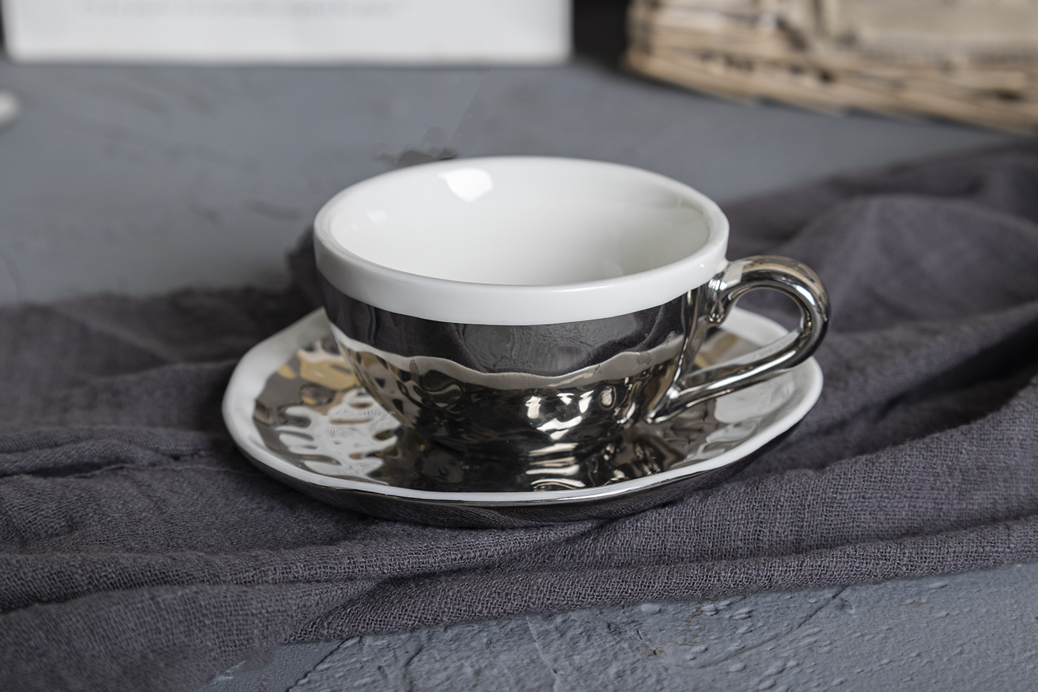 CHANGSHA HAPPY GO Reflective Silver Electroplated Bone China Tea and Dinnerware Set with Hammer Texture for Elegant Dining Occasions |happygodinnerware.com