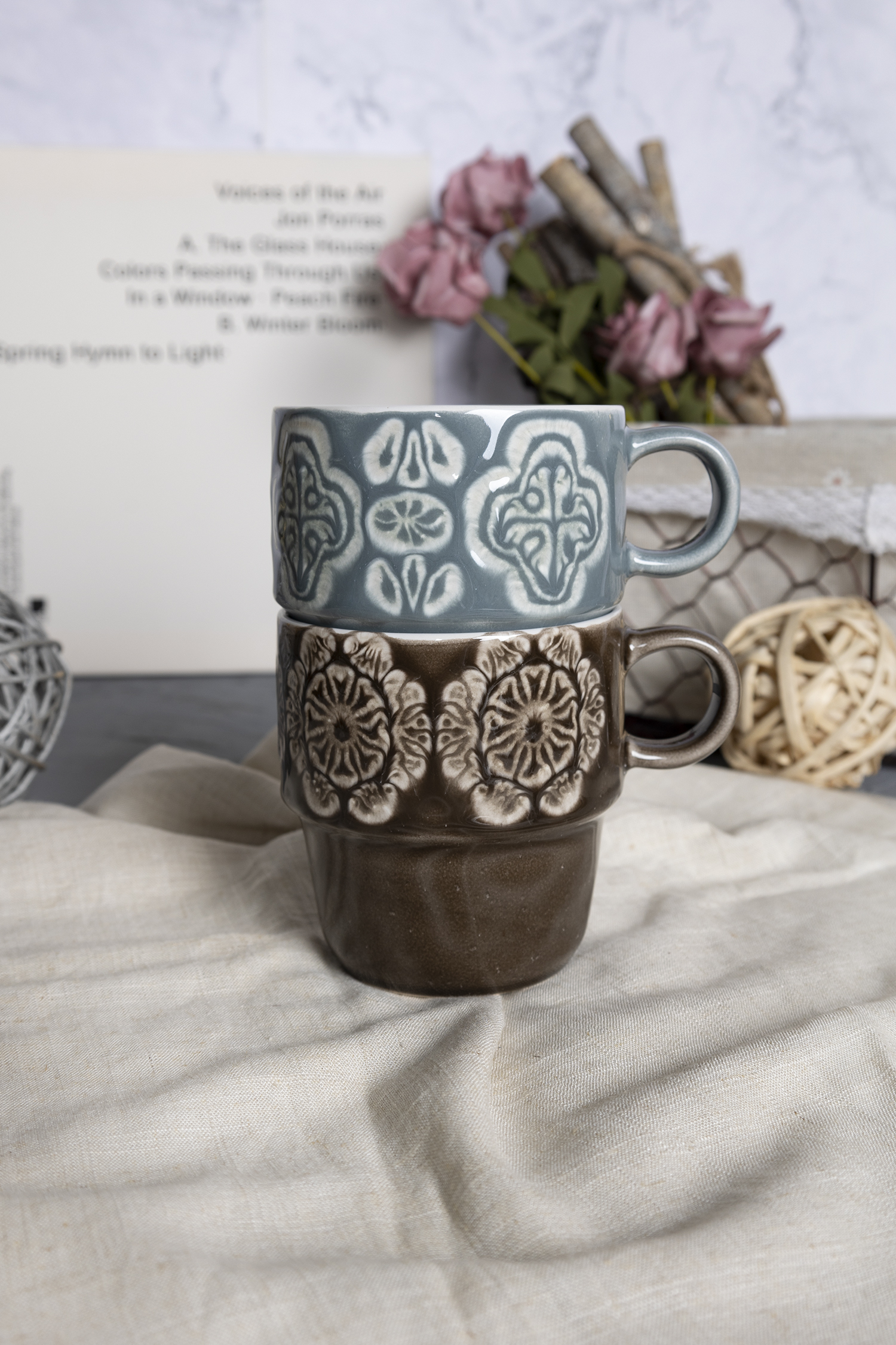 CHANGSHA HAPPY GO  Vintage-Inspired Embossed Stoneware Mug Set with Blue and Mocha Reactive Glaze – Artisan Textures and Classic Floral Relief Design for Elegant Everyday Use|happygodinnerware.com