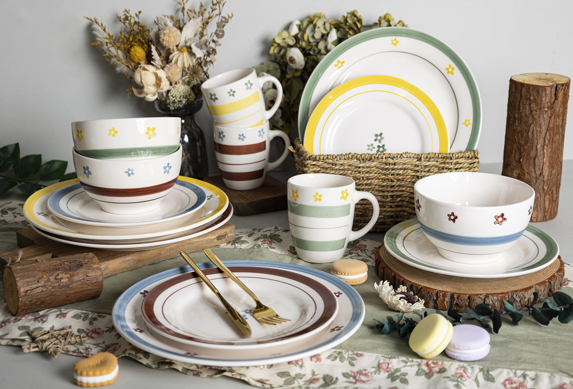 CHANGSHA HAPPY GO Fine Earthware Playful Dinnerware Set with Hand-Painted Colorful Small Flowers and Striped Accents  |happygodinnerware.com