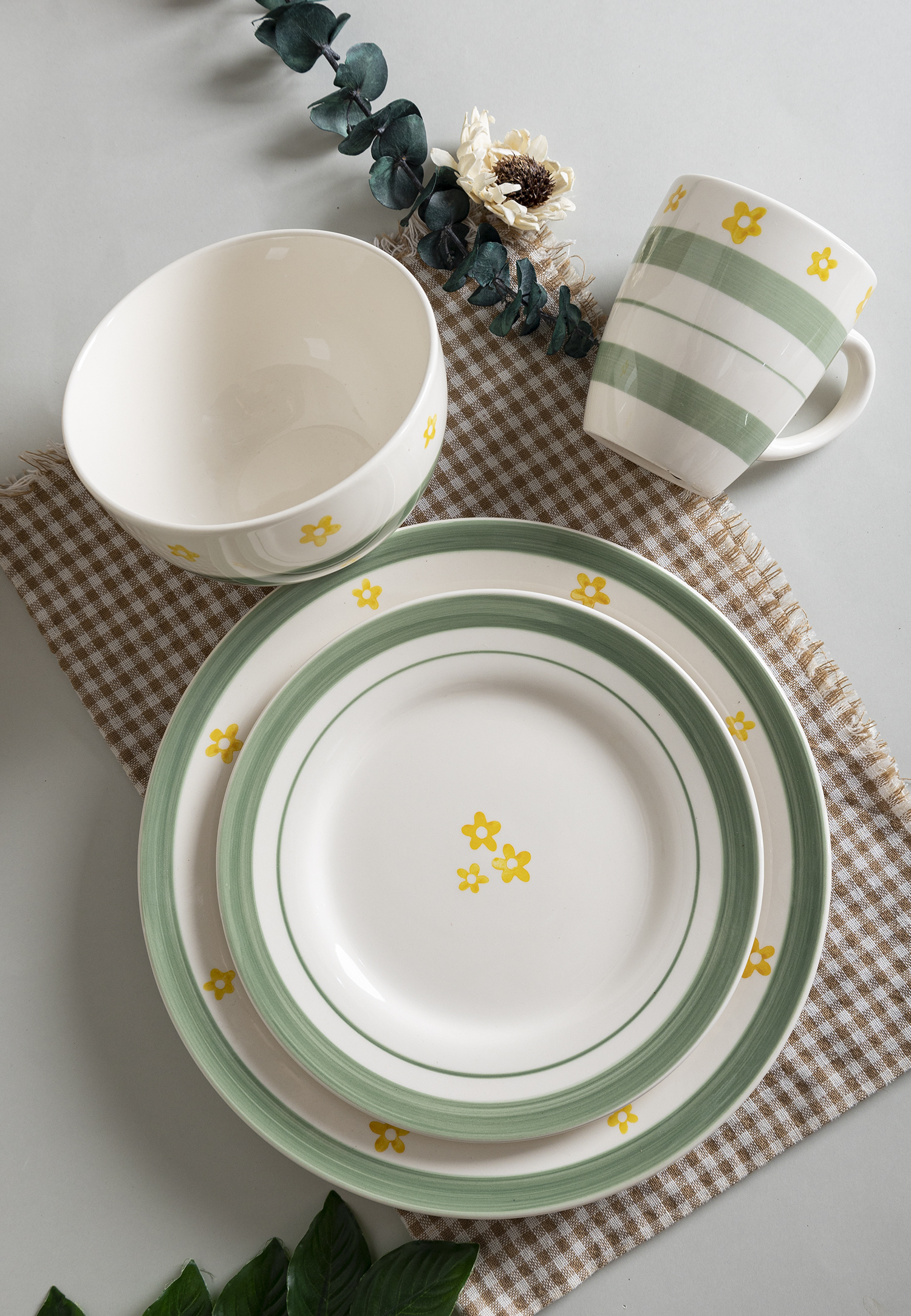 CHANGSHA HAPPY GO Fine Earthware Playful Dinnerware Set with Hand-Painted Colorful Small Flowers and Striped Accents  |happygodinnerware.com