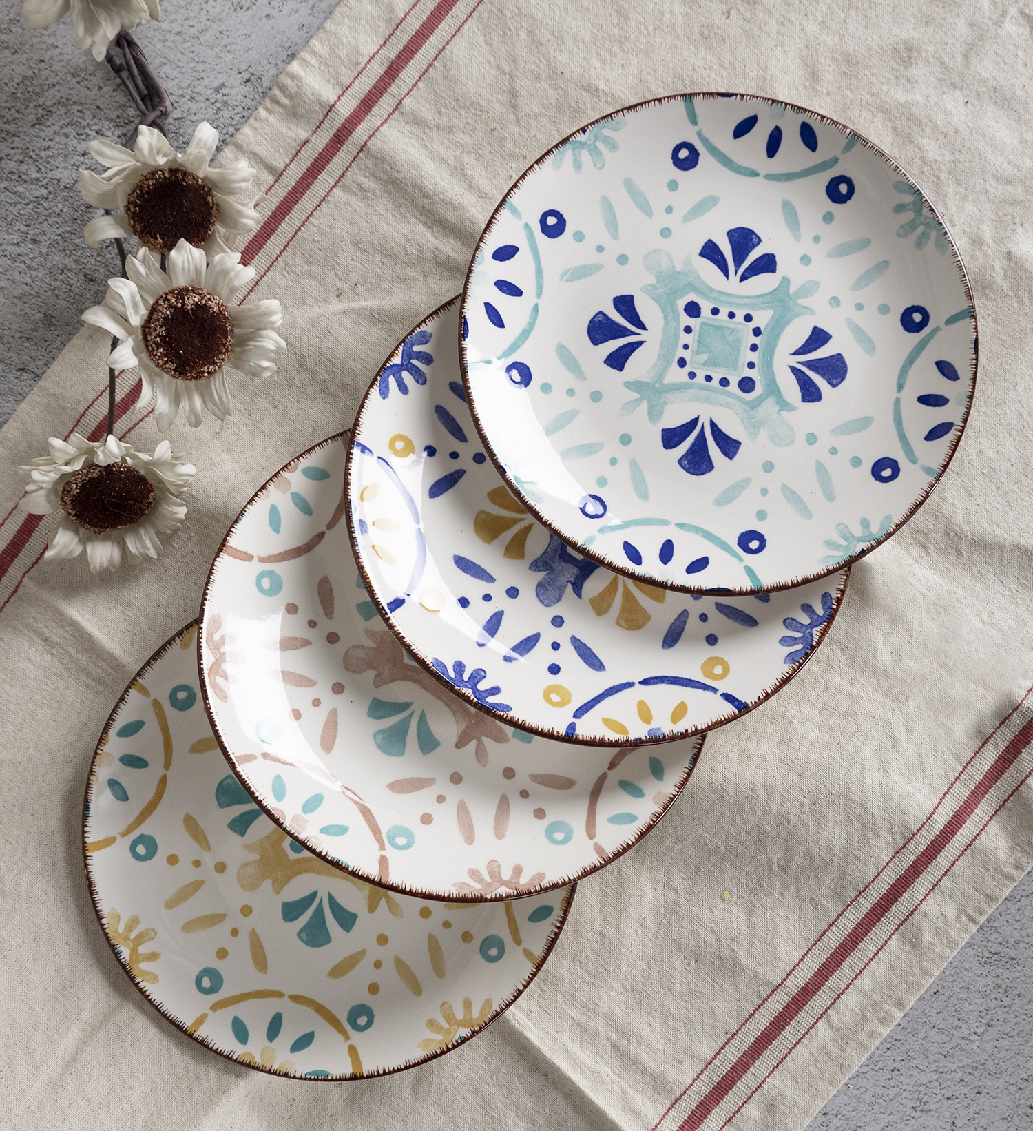 CHANGSHA HAPPY GO Bohemian Colorful Stoneware Handpainted Dinnerware Set with Artistic Floral and Geometric Accents  |happygodinnerware.com