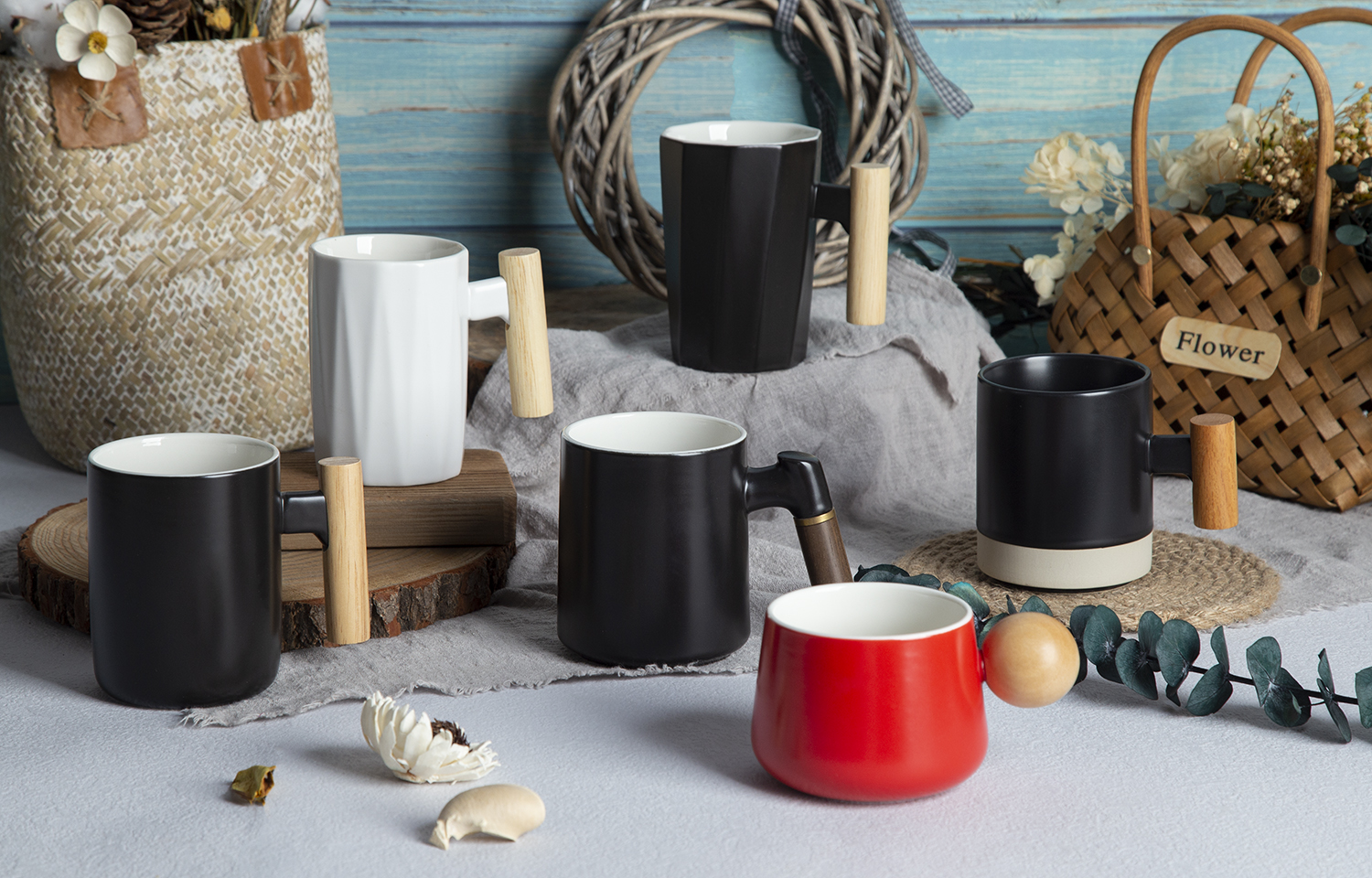 CHANGSHA HAPPY GO Stoneware Embossed & Colored Glaze Craft Mugs with Wooden Handles |happygodinnerware.com