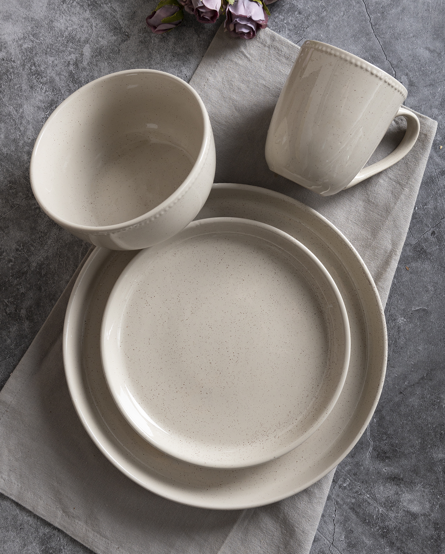 CHANGSHA HAPPY GO  Dot Embossed Reactive Glaze Stoneware Dinner Set in Light Gray with Textured Detail  |happygodinnerware.com