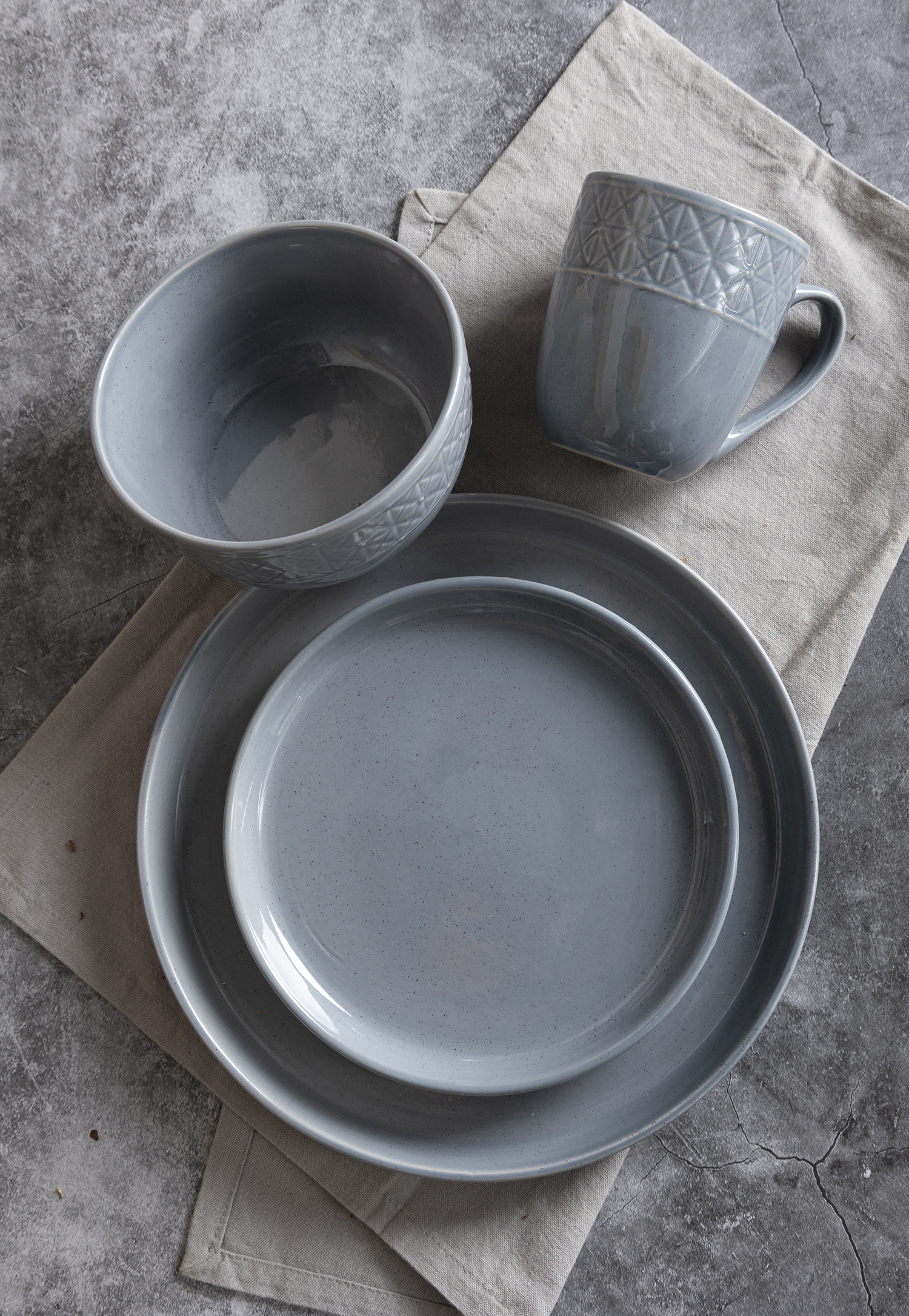 CHANGSHA HAPPY GO  Beaded Rim Embossed Reactive Glaze Stoneware Dinner Set in Warm Beige with Classic Touch  |happygodinnerware.com