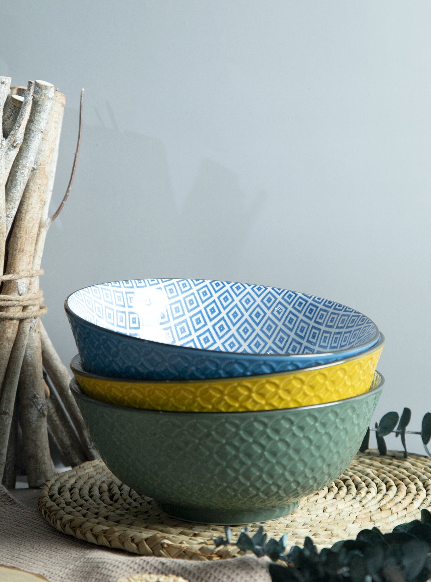 CHANGSHA HAPPY GO White Porcelain Coin Pattern Embossed Bowls with Colorful Glaze Interiors | happygodinnerware.com