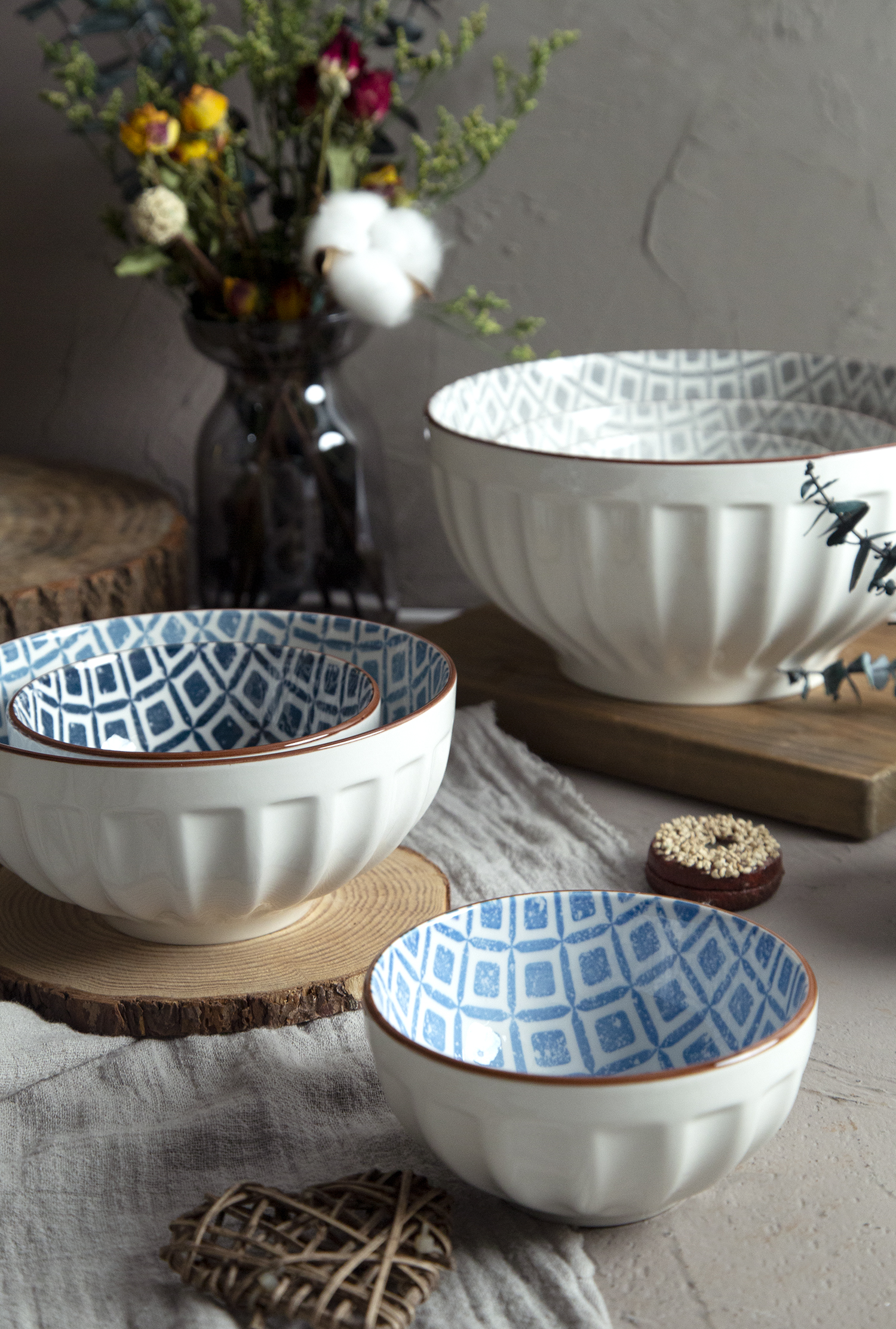CHANGSHA HAPPY GO White Porcelain Melon Stripe Embossed Bowls with Blue Geometric Interiors | happygodinnerware.com
