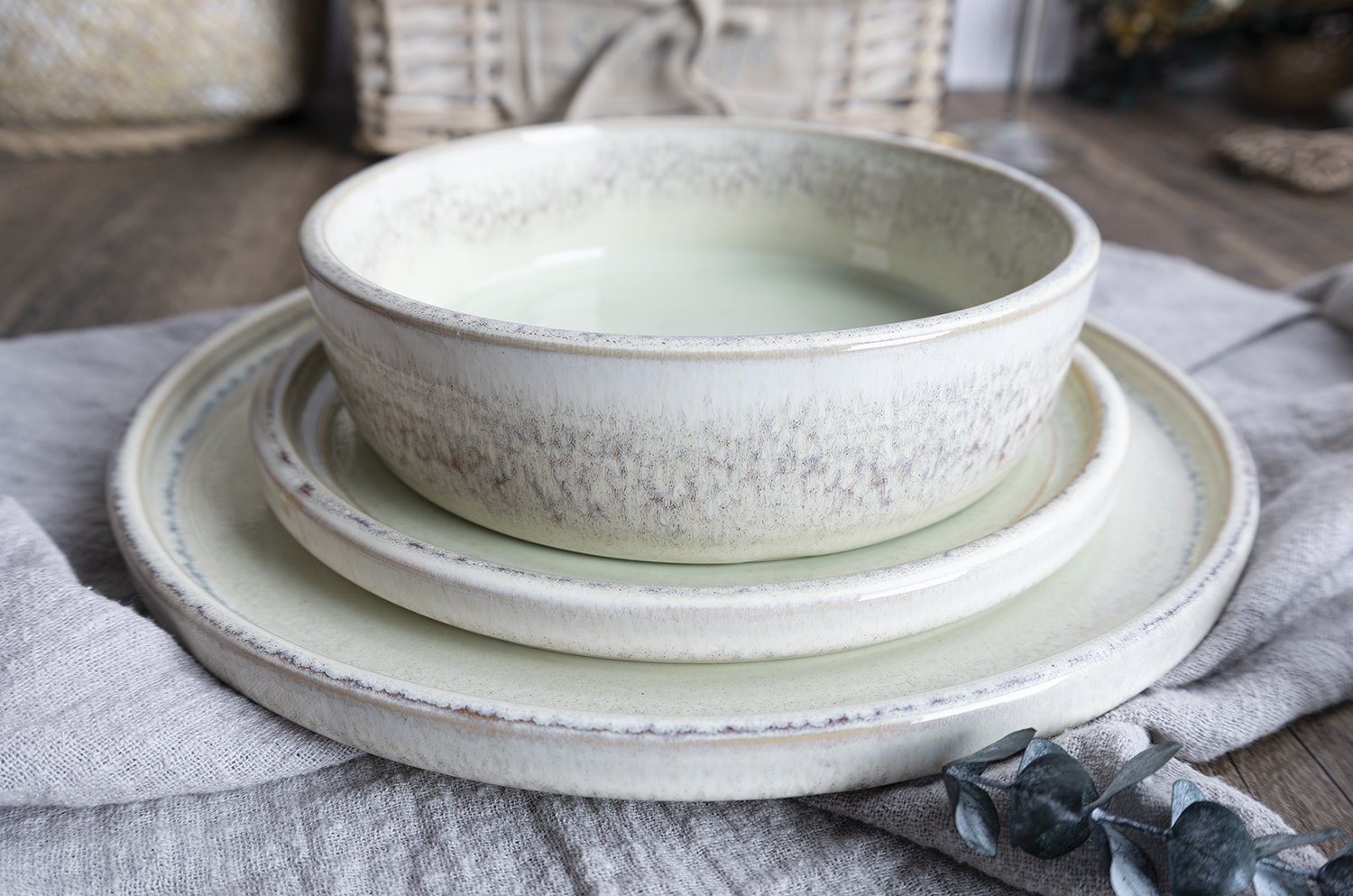 CHANGSHA HAPPY GO  Modern Reactive Glaze Stoneware Dinner Set in Soft Mint Green with Faded Rim Accents  |happygodinnerware.com
