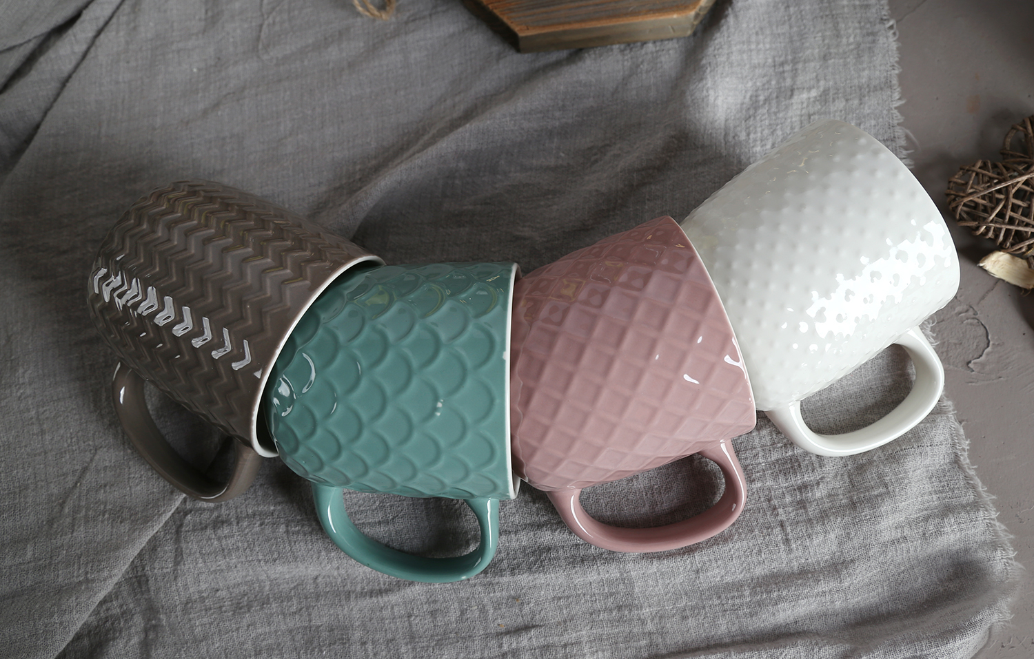 CHANGSHA HAPPY GO Assorted Color Glazed Embossed Bone China Mugs – Elegant Texture Meets Vibrant Mix |happygodinnerware.com