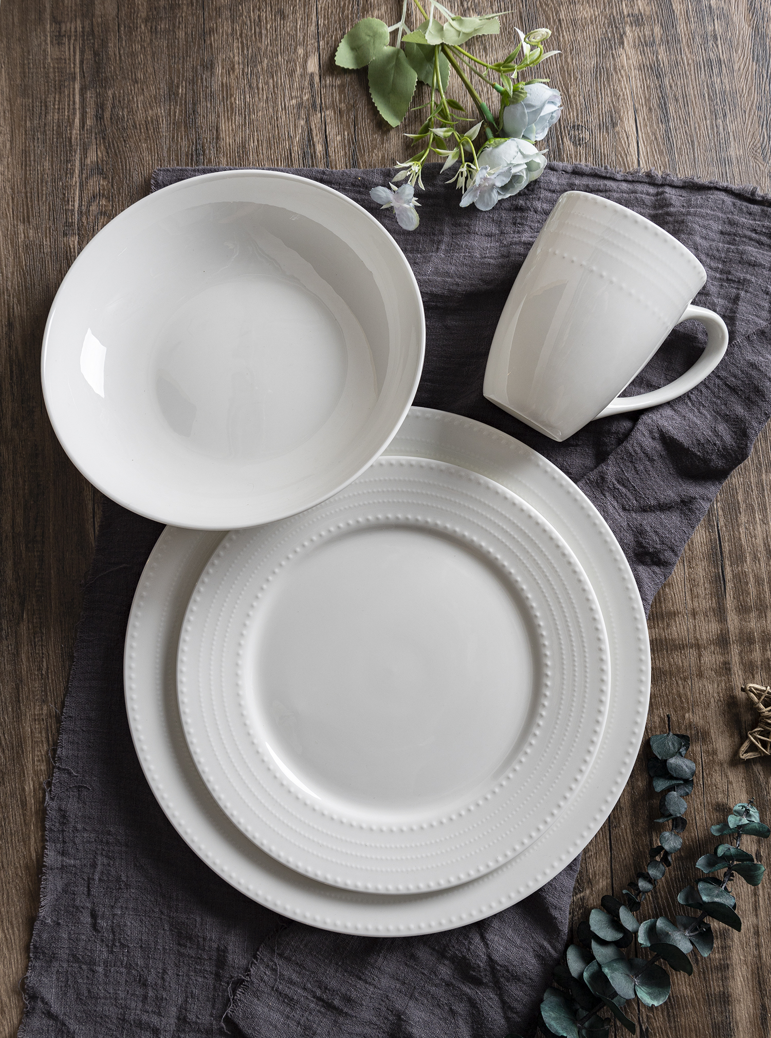 CHANGSHA HAPPY GO Minimalist Bone China Embossed Tableware Set with Delicate Dot Pattern for Modern Home Use |happygodinnerware.com