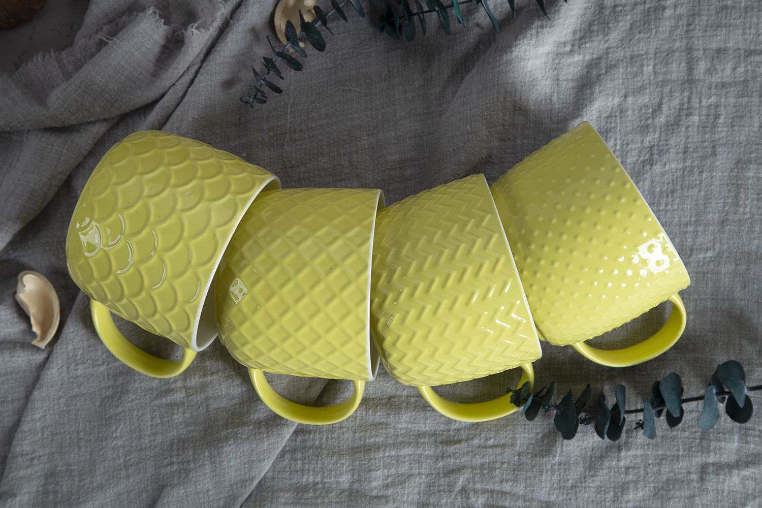 CHANGSHA HAPPY GO Yellow Embossed Bone China Mugs – Color Glaze with 3D Relief Pattern Finish |happygodinnerware.com