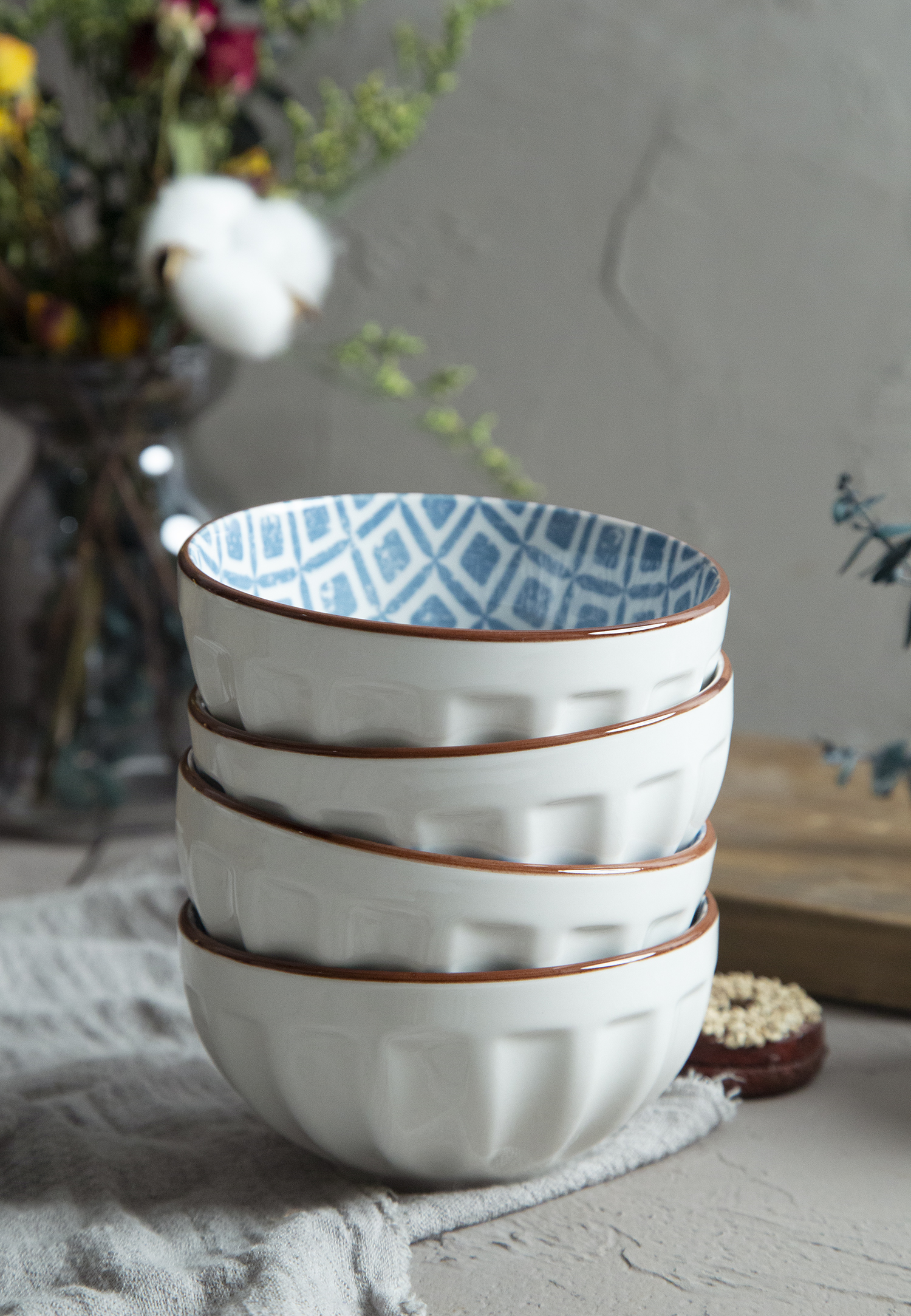 CHANGSHA HAPPY GO White Porcelain Melon Stripe Embossed Bowls with Blue Geometric Interiors | happygodinnerware.com