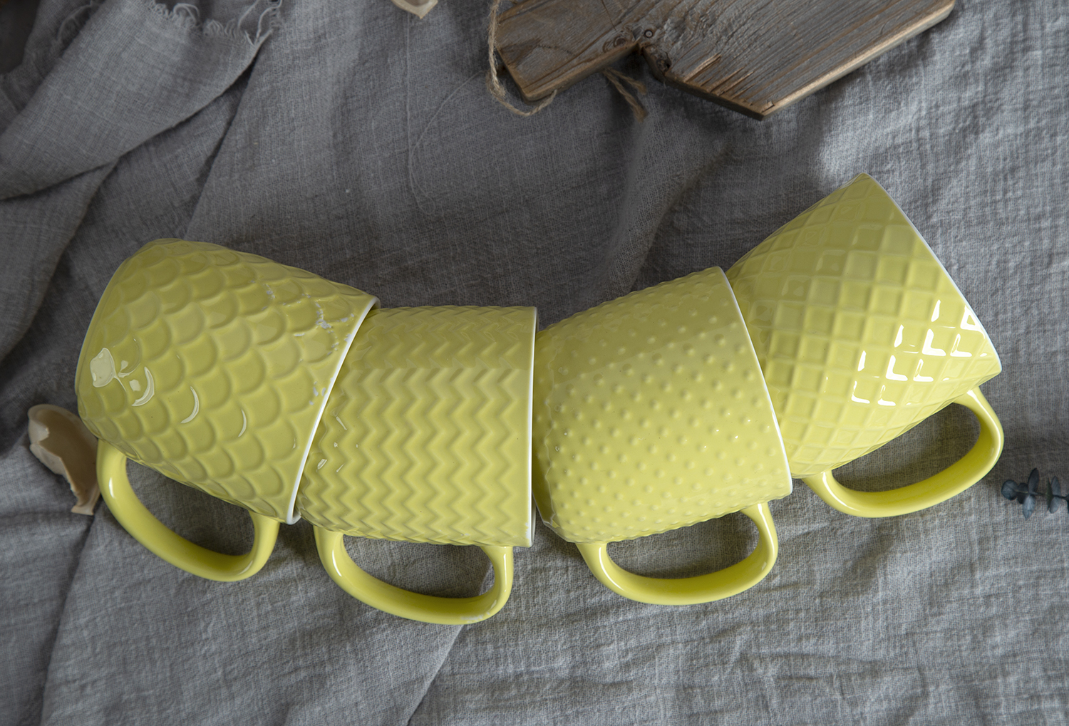 CHANGSHA HAPPY GO Yellow Embossed Bone China Mugs – Color Glaze with 3D Relief Pattern Finish |happygodinnerware.com