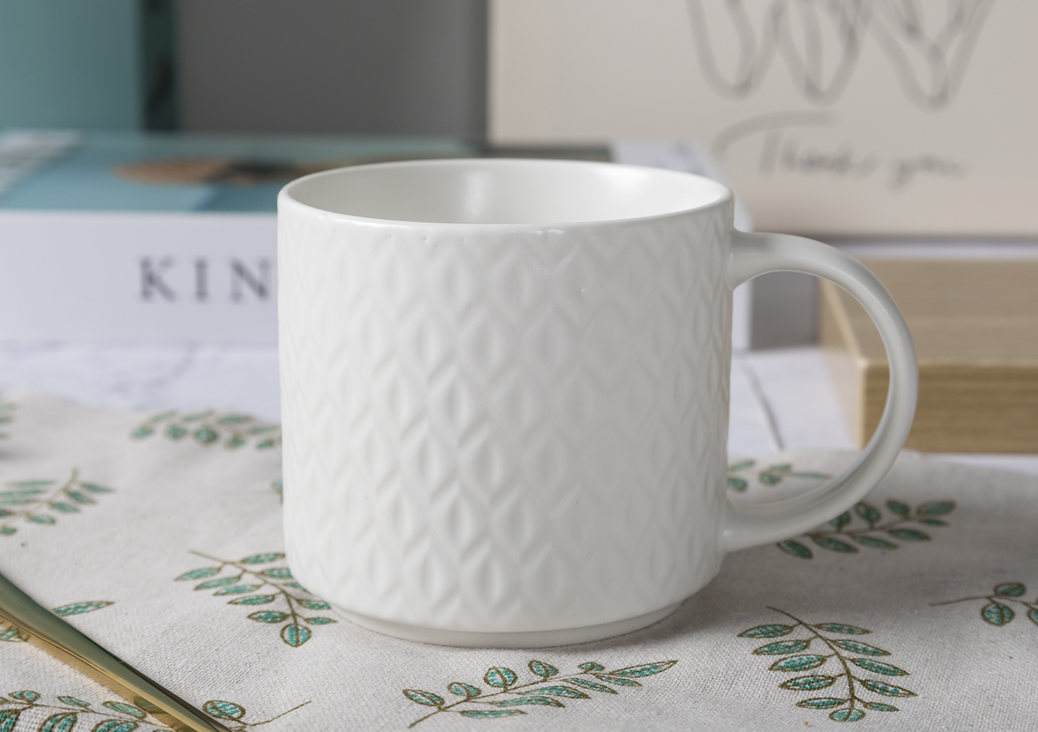 CHANGSHA HAPPY GO Matte Black and White Reactive Glaze New Bone China with Embossed Craft Mug Set | happygodinnerware.com