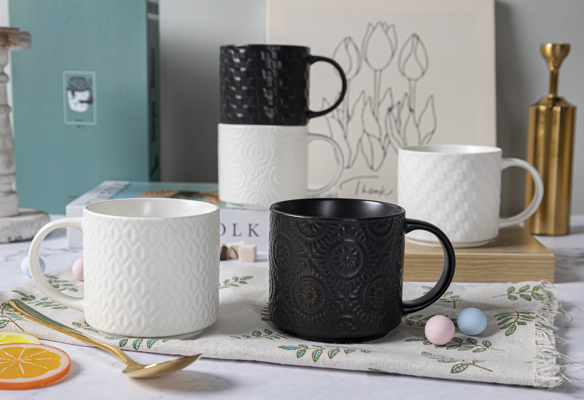CHANGSHA HAPPY GO Matte Black and White Reactive Glaze New Bone China with Embossed Craft Mug Set | happygodinnerware.com