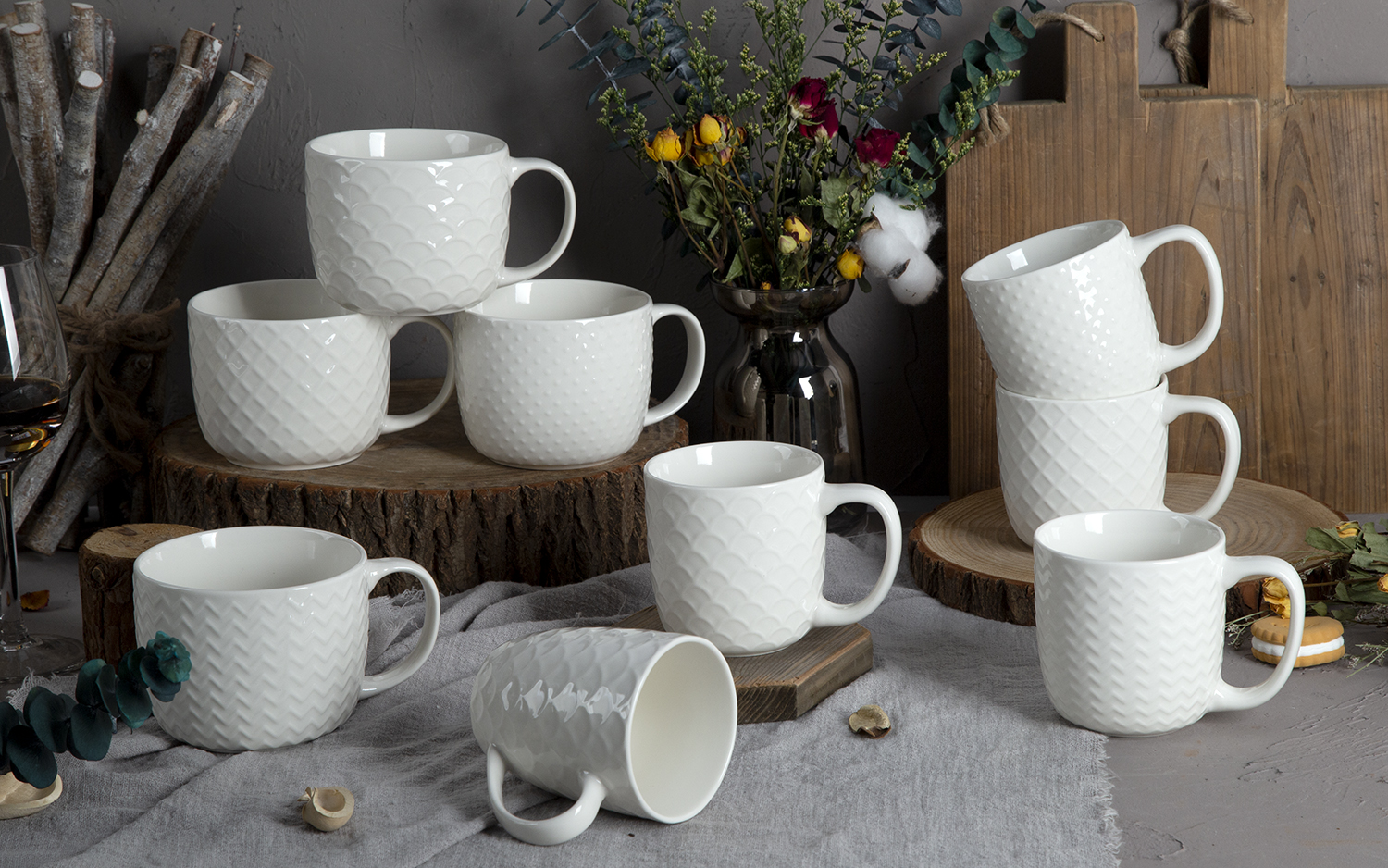 CHANGSHA HAPPY GO White Embossed Bone China Mugs – Glossy Color Glaze with 3D Relief Texture |happygodinnerware.com